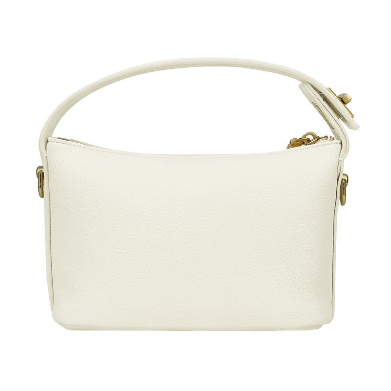 The lady holds her bag with a handsome gesture