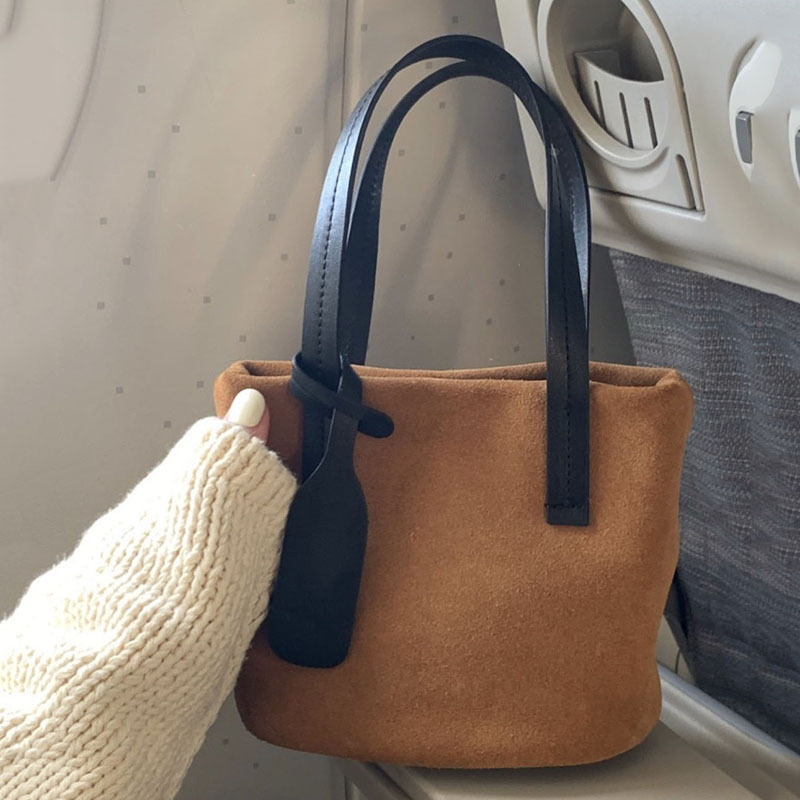 Lady's soft camel-colored handbag