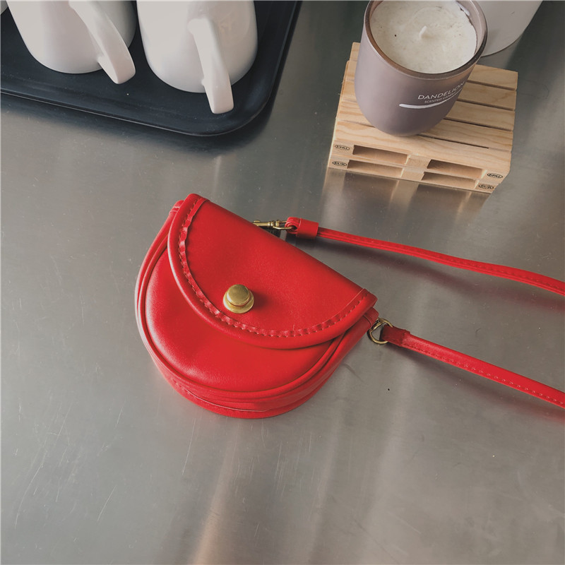 Lady's red small crossbody bag