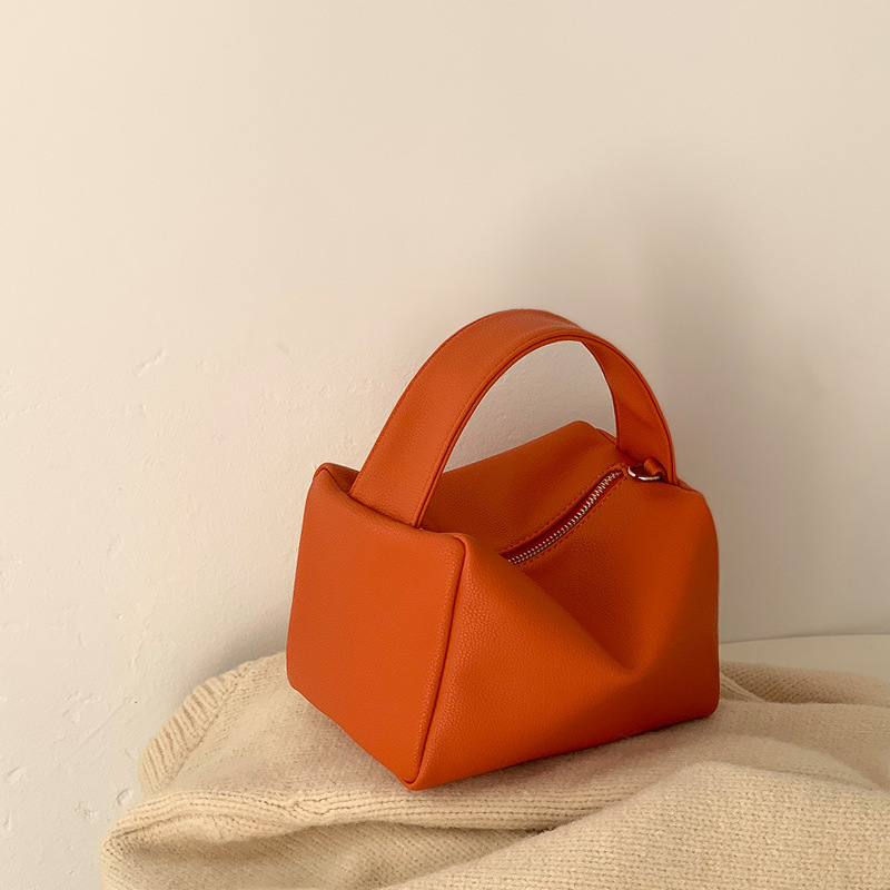 Lady's candy-colored hand-held small bag