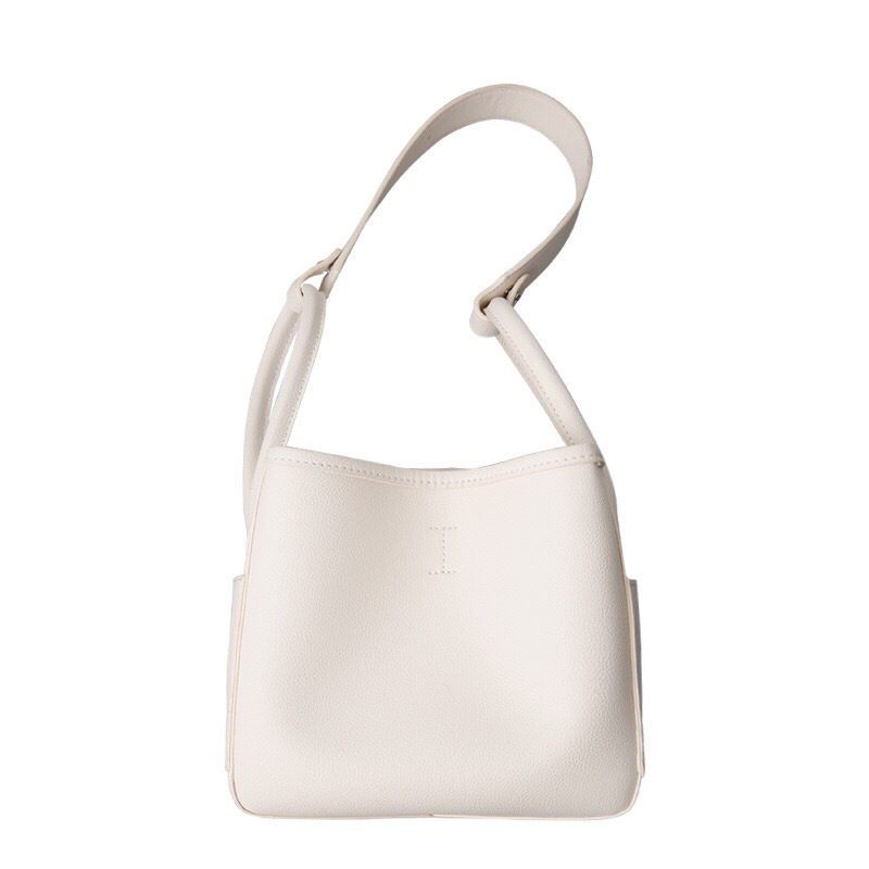 Lady's white bucket bag